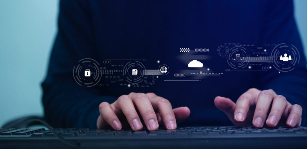 Man Is Typing On Keyboard